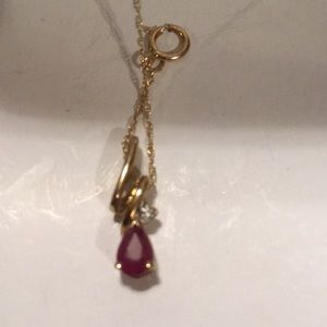 Ruby necklace with a small diamond